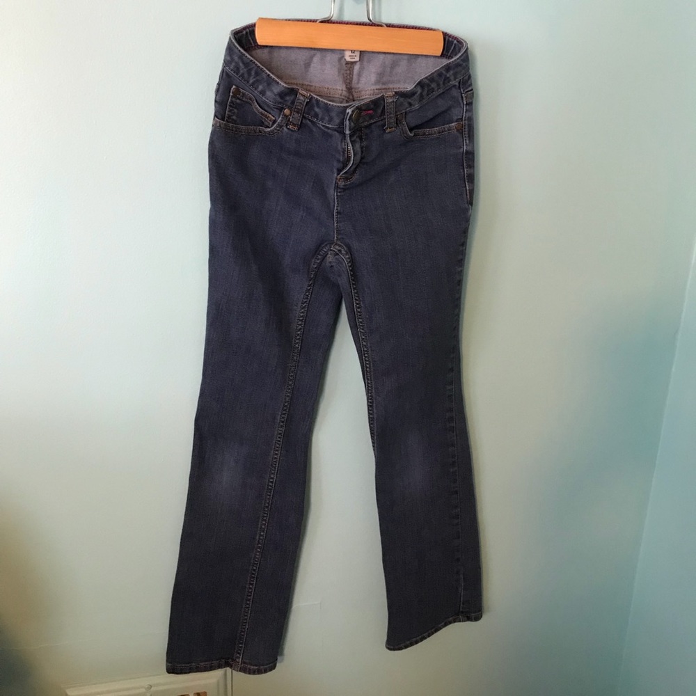 Like new. Justice boot-cut blue jeans. Girls 12.